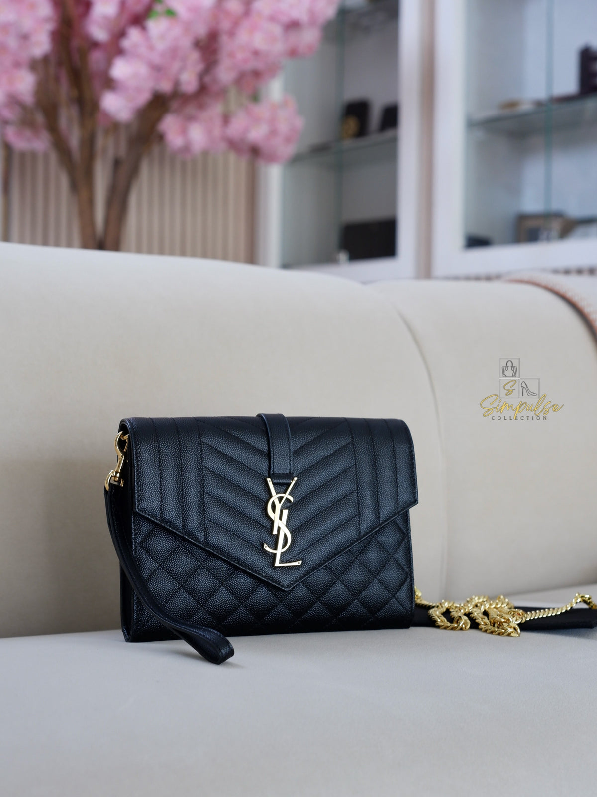 YSL ENVELOPE FLAP WRISTLET