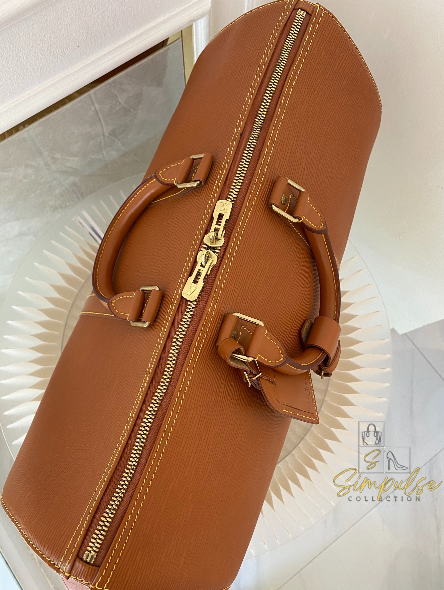 Louis Vuitton Keepall Epi Leather Cipango Gold