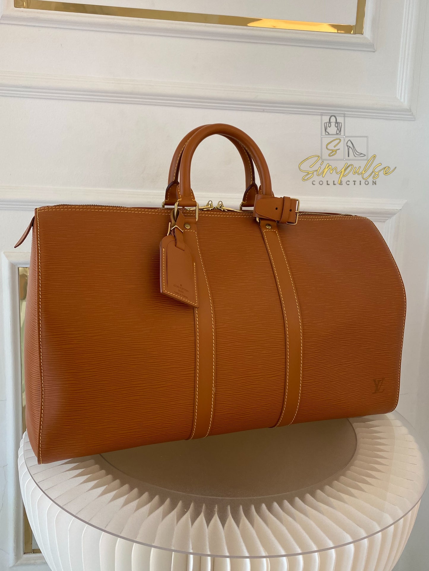 Louis Vuitton Keepall Epi Leather Cipango Gold