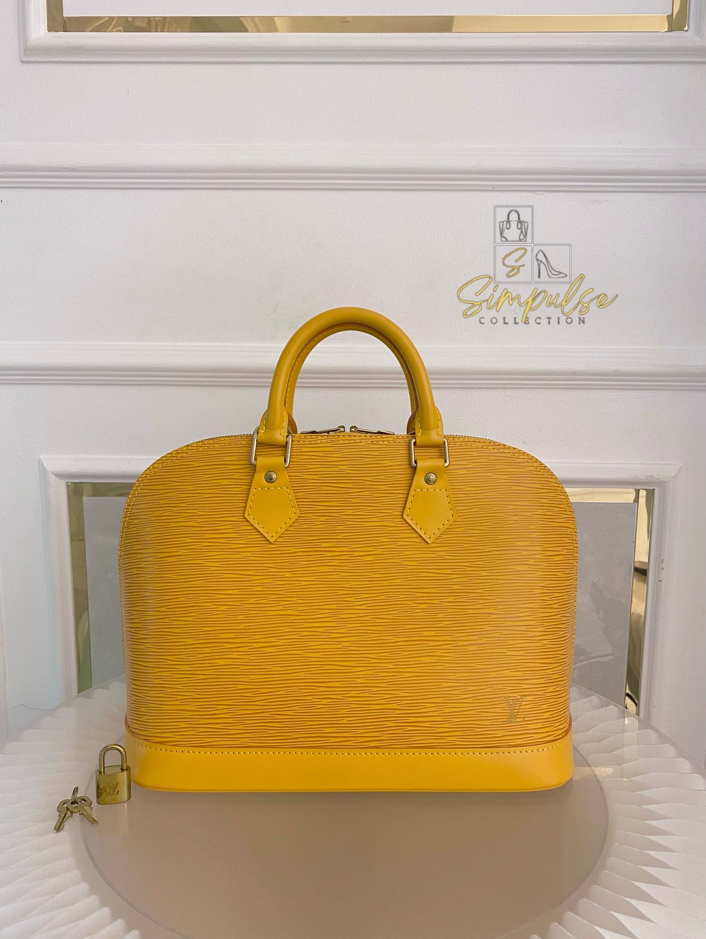 Louis Vuitton Epi Alma Bag Yellow
