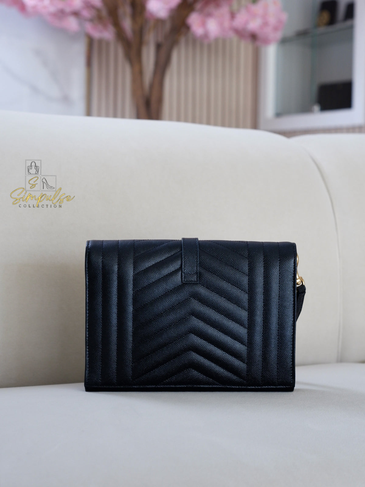YSL ENVELOPE FLAP WRISTLET