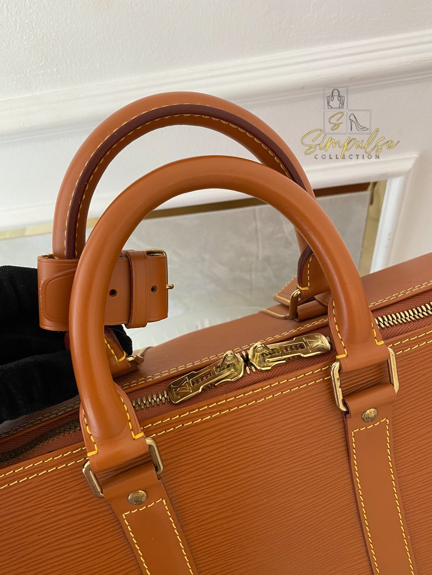 Louis Vuitton Keepall Epi Leather Cipango Gold