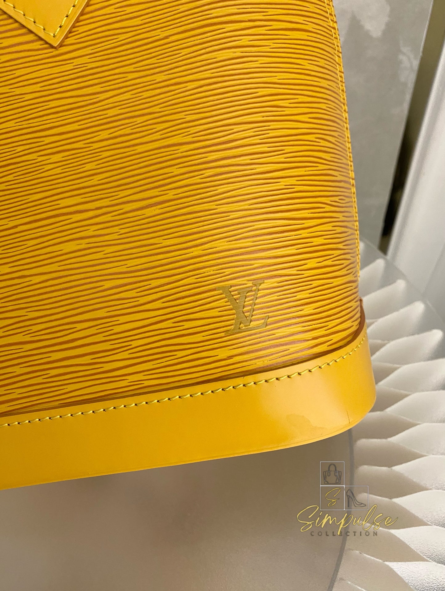 Louis Vuitton Epi Alma Bag Yellow
