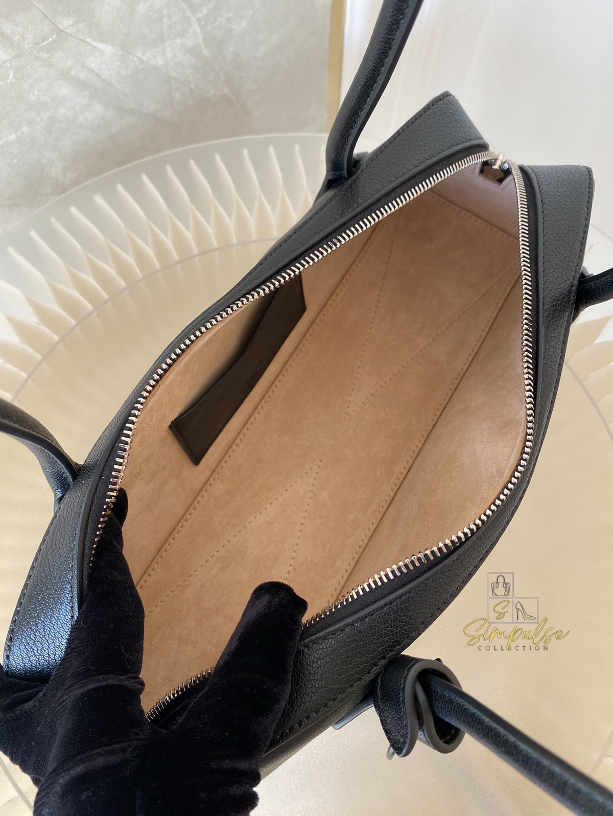 ALAIA LE TECKEL MEDIUM BAG IN GOATSKIN IN BLACK