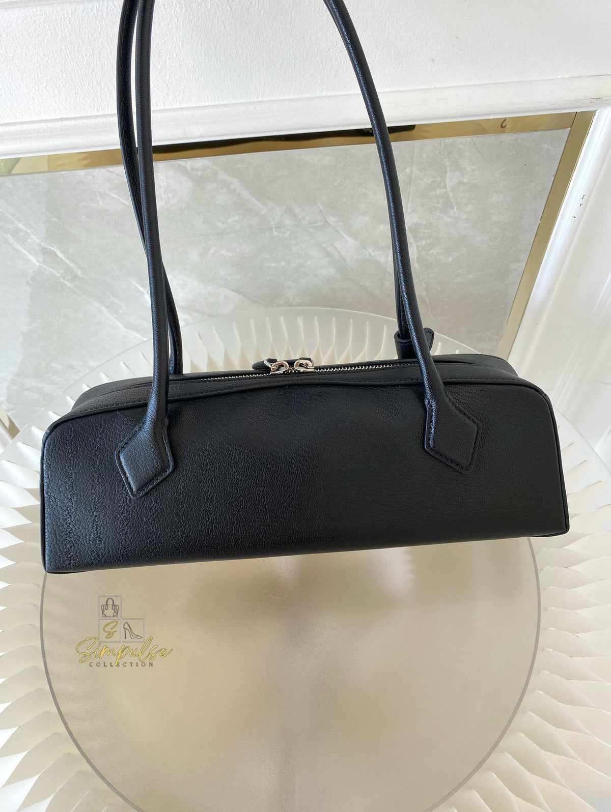 ALAIA LE TECKEL MEDIUM BAG IN GOATSKIN IN BLACK