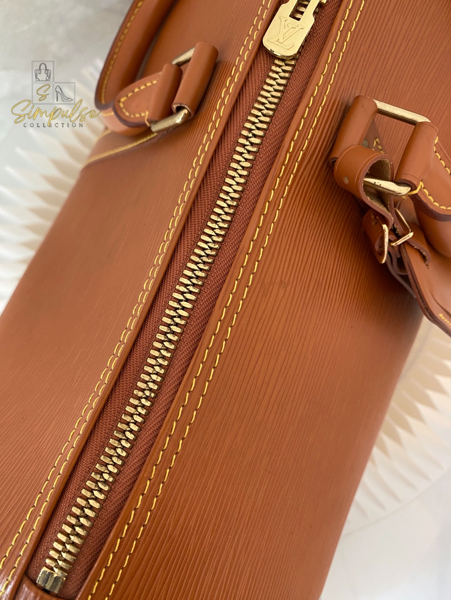 Louis Vuitton Keepall Epi Leather Cipango Gold