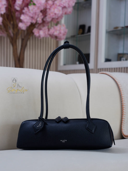 ALAIA LE TECKEL MEDIUM BAG IN GOATSKIN IN BLACK