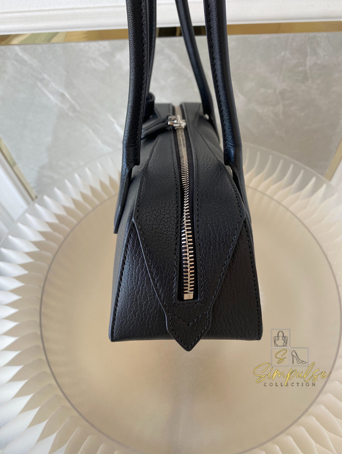 ALAIA LE TECKEL MEDIUM BAG IN GOATSKIN IN BLACK