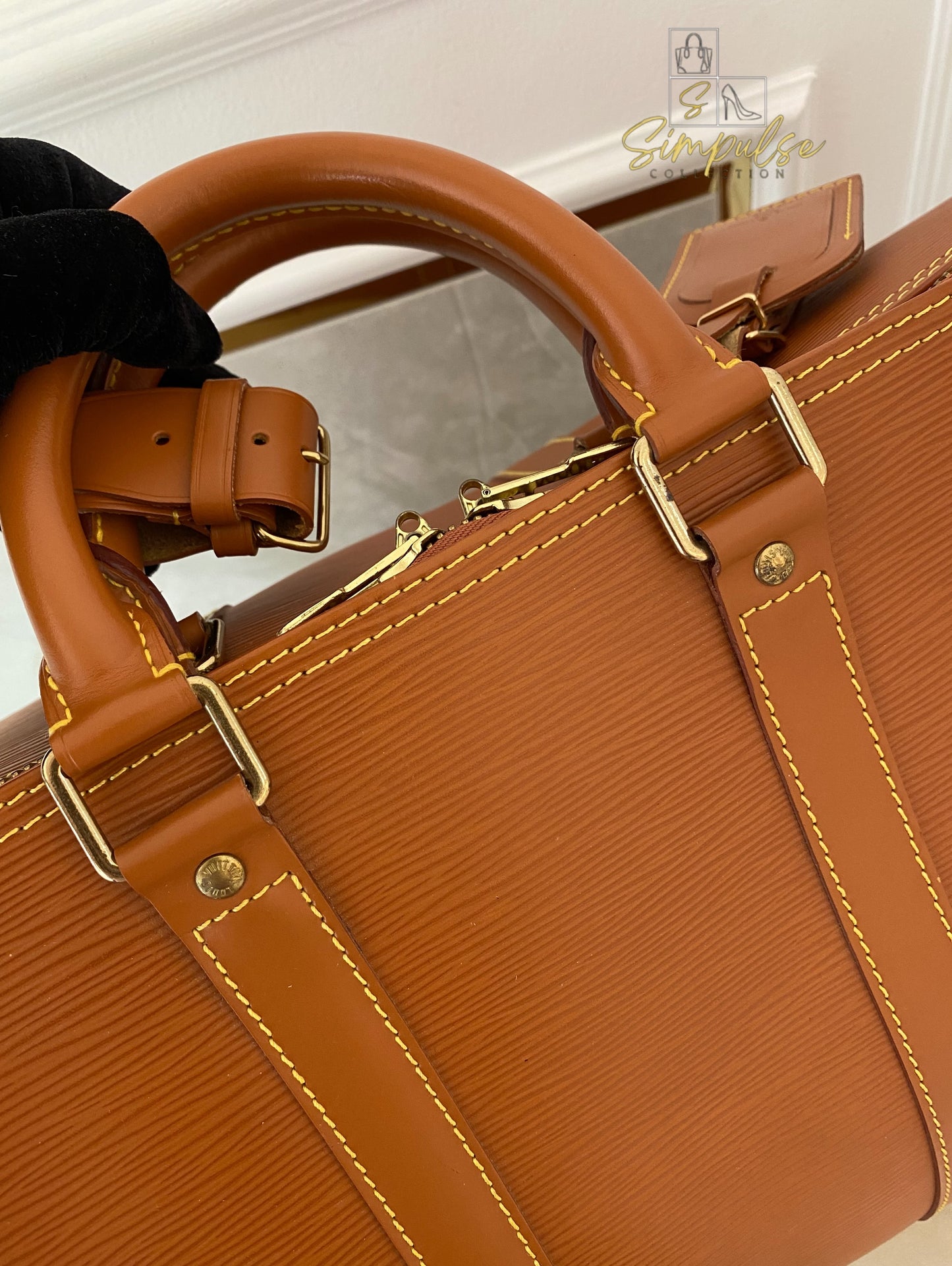 Louis Vuitton Keepall Epi Leather Cipango Gold