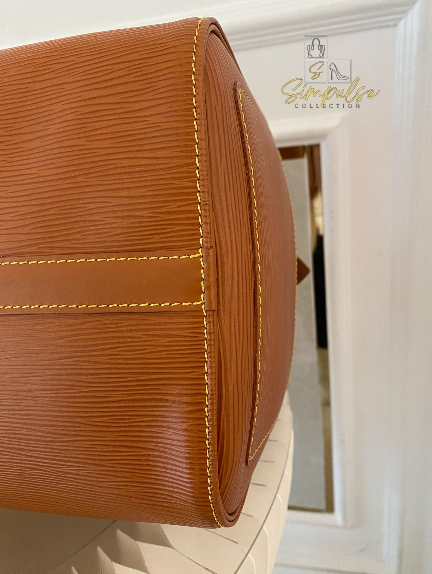 Louis Vuitton Keepall Epi Leather Cipango Gold