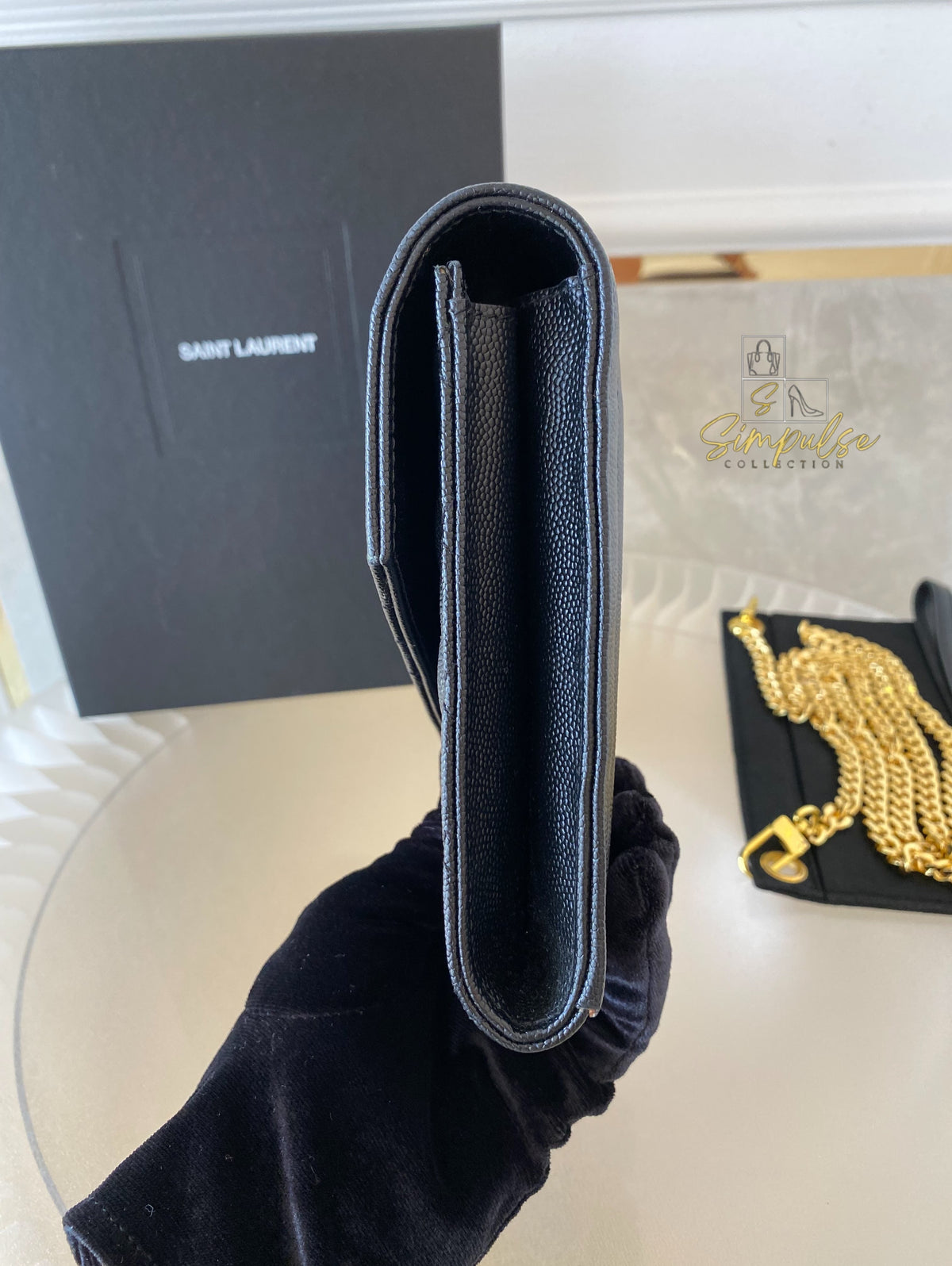 YSL ENVELOPE FLAP WRISTLET