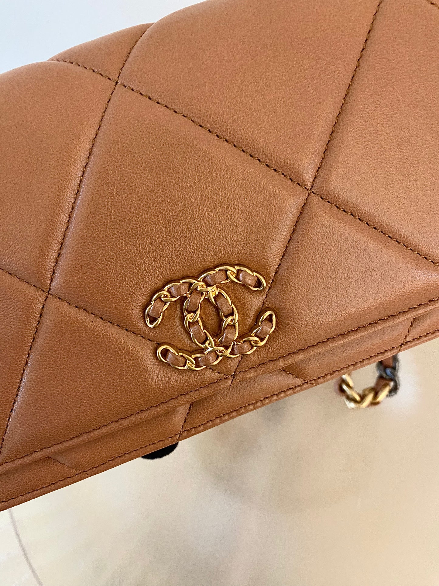 CHANEL C19 WOC Brown Quilted Lambskin Leather