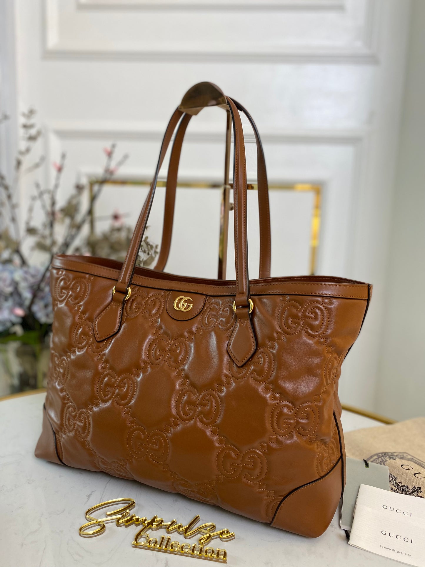 GG EMBOSSED MATELLASE BROWN SHOULDER TOTE