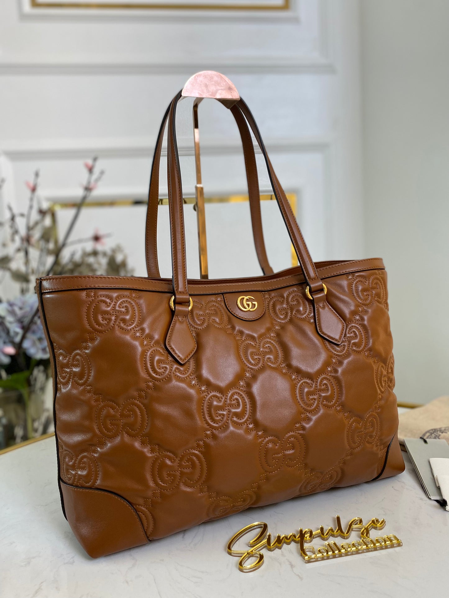 GG EMBOSSED MATELLASE BROWN SHOULDER TOTE