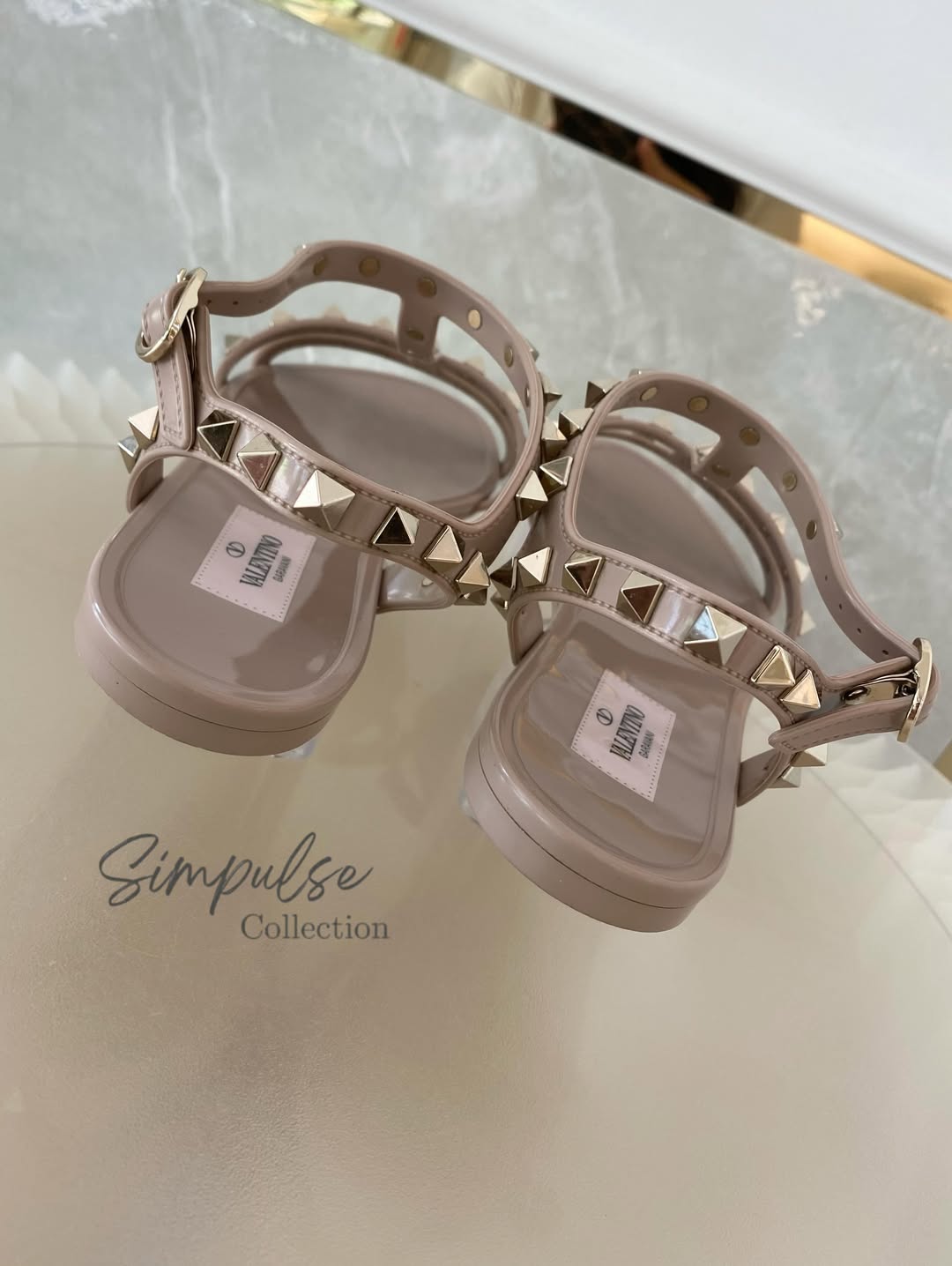 Valentino Garavani Rockstud Flat Rubber Sandals Nude