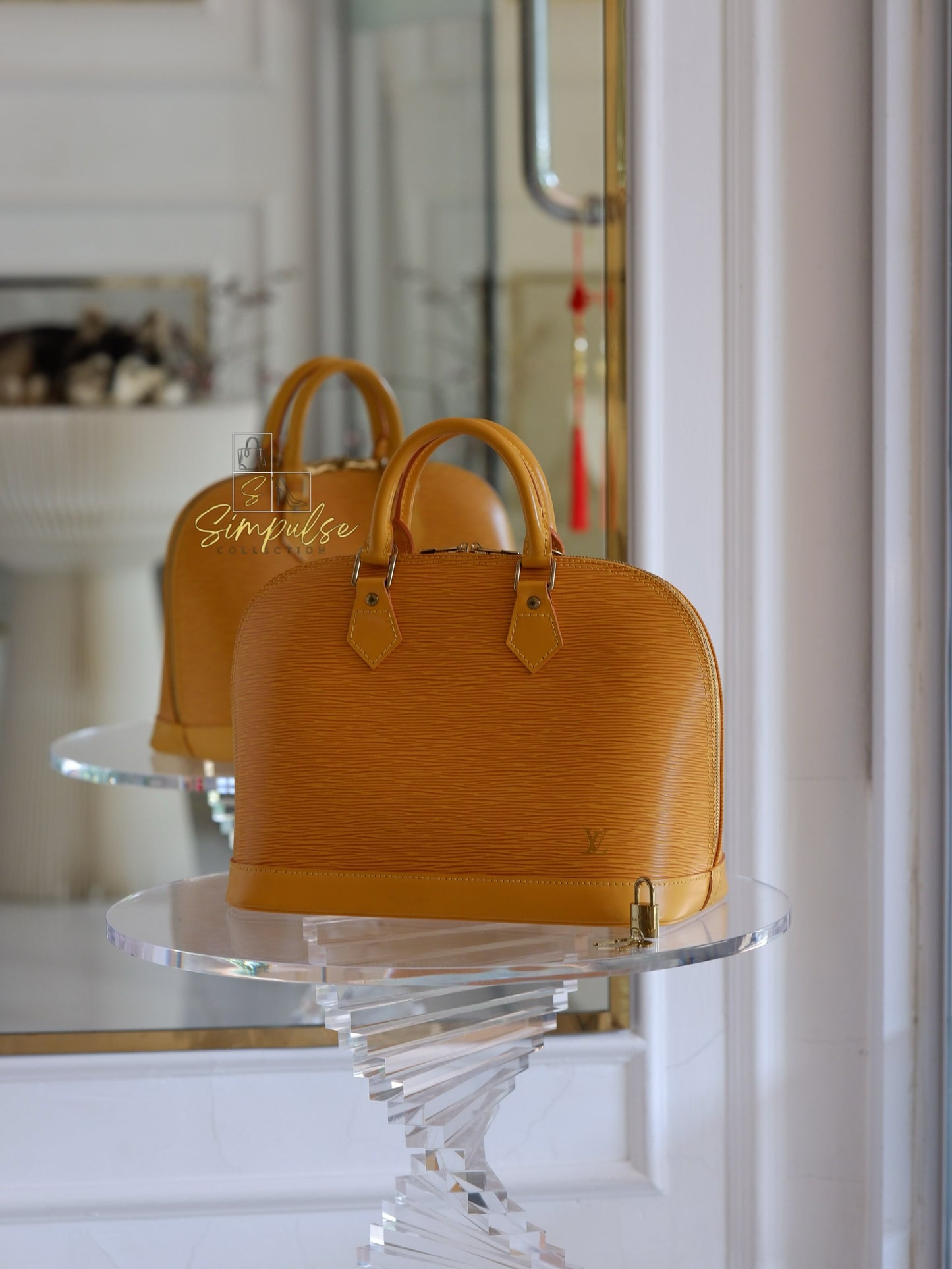 Louis Vuitton Epi Alma Bag