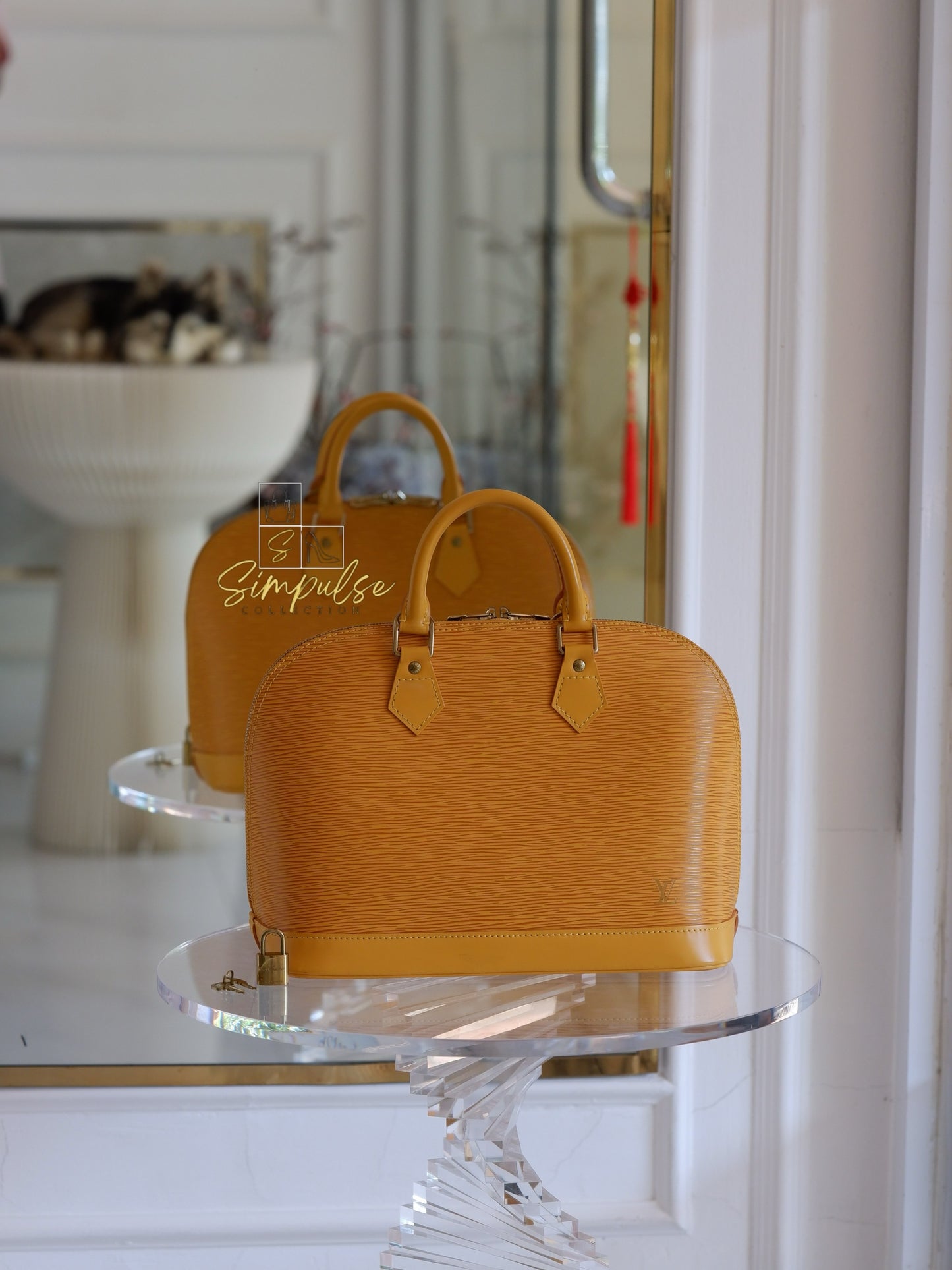 Louis Vuitton Epi Alma Bag