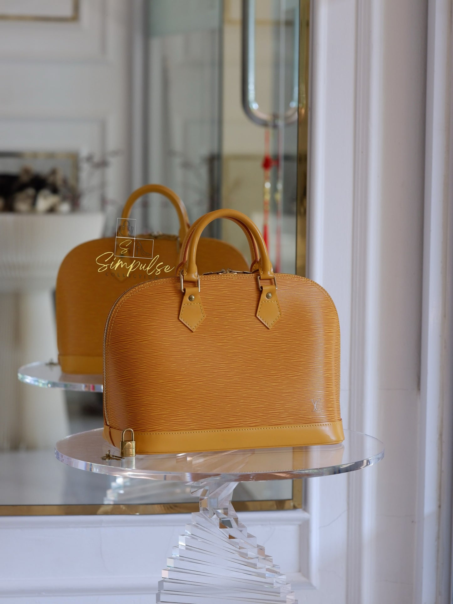 Louis Vuitton Epi Alma Bag