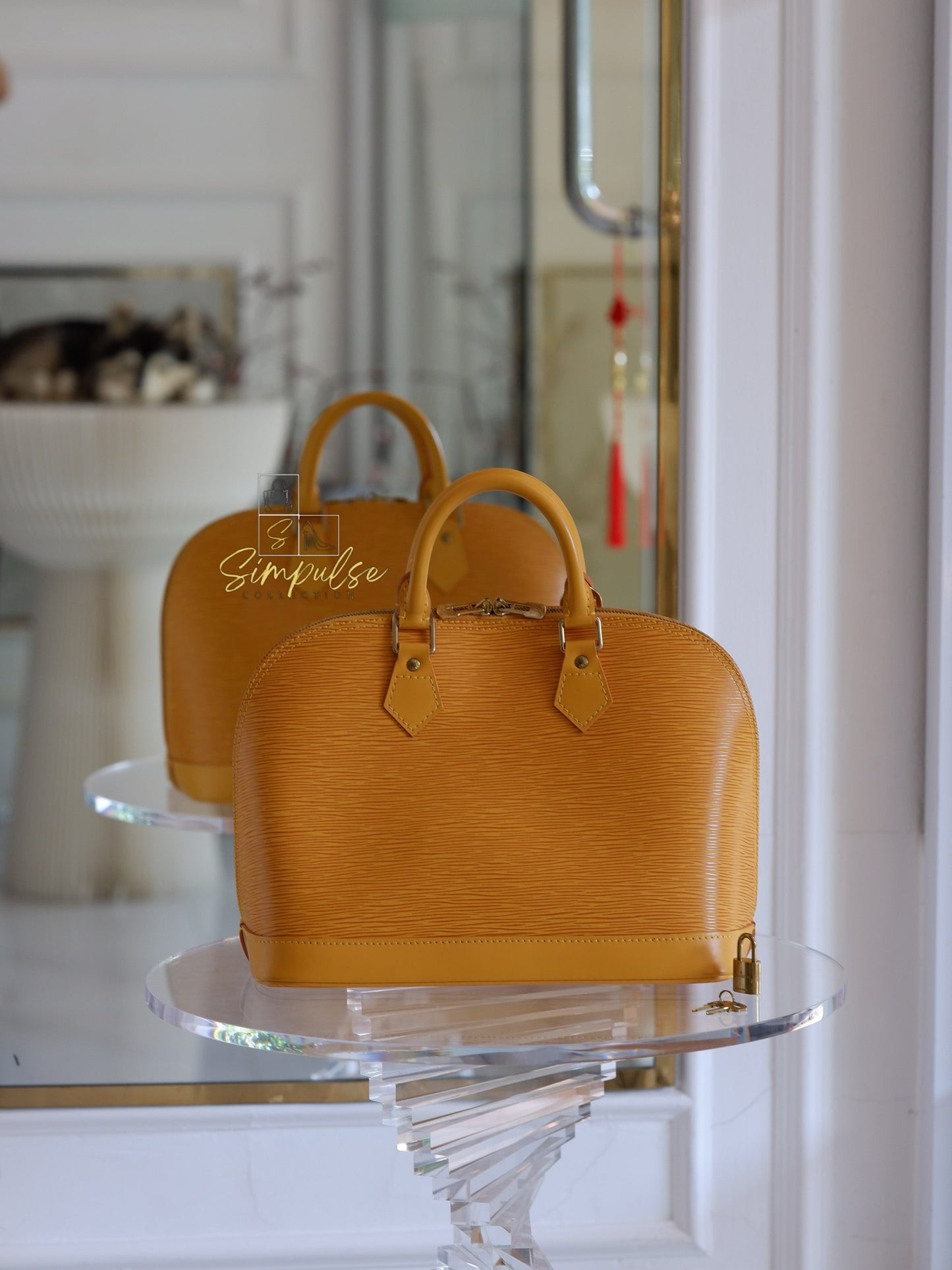 Louis Vuitton Epi Alma Bag