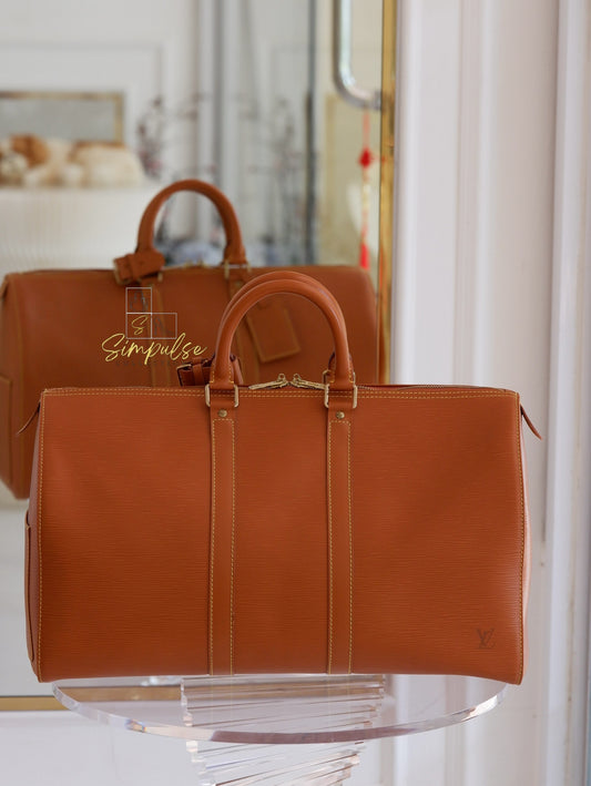 Louis Vuitton Keepall Epi Leather Cipango Gold