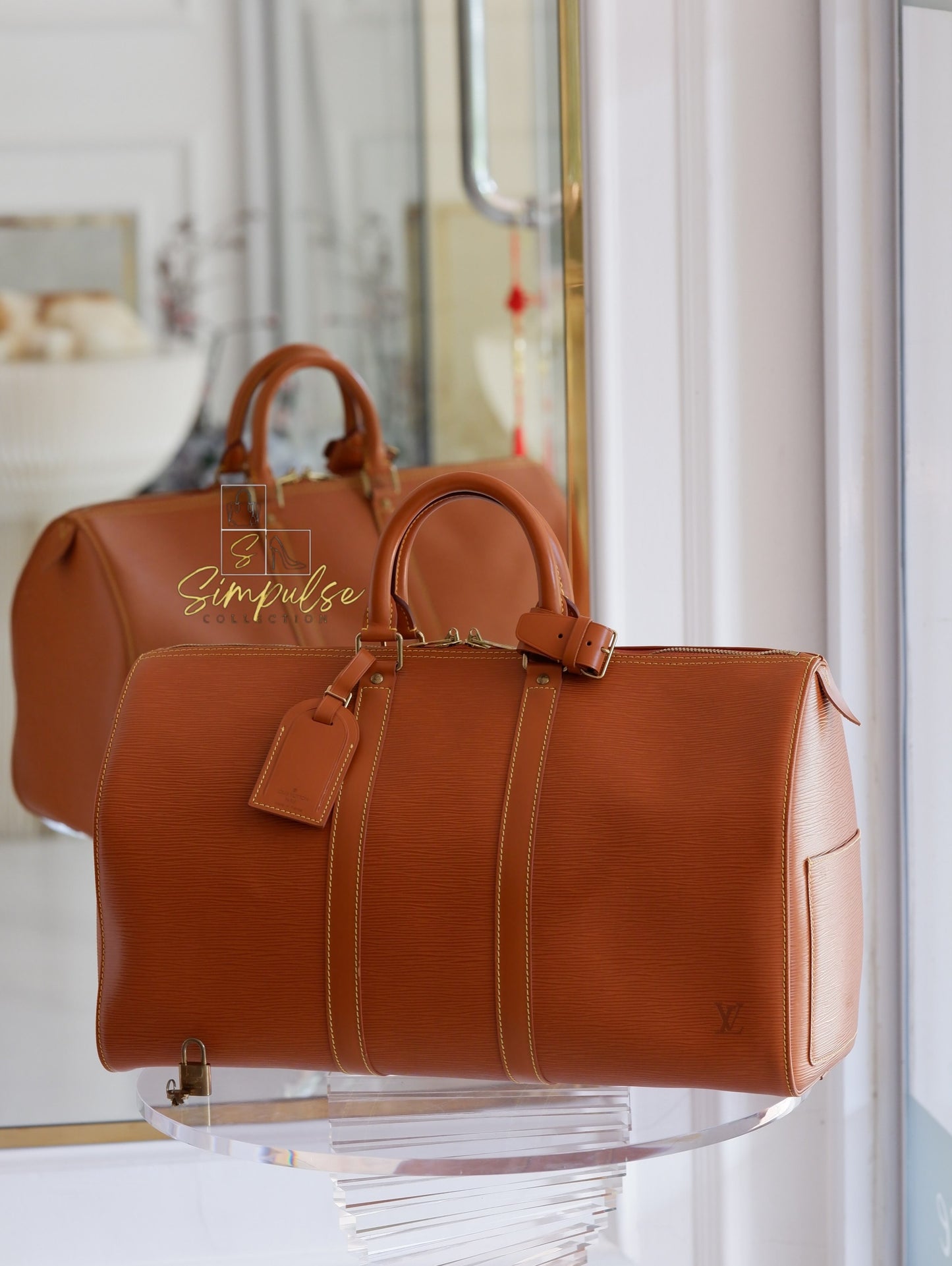 Louis Vuitton Keepall Epi Leather Cipango Gold