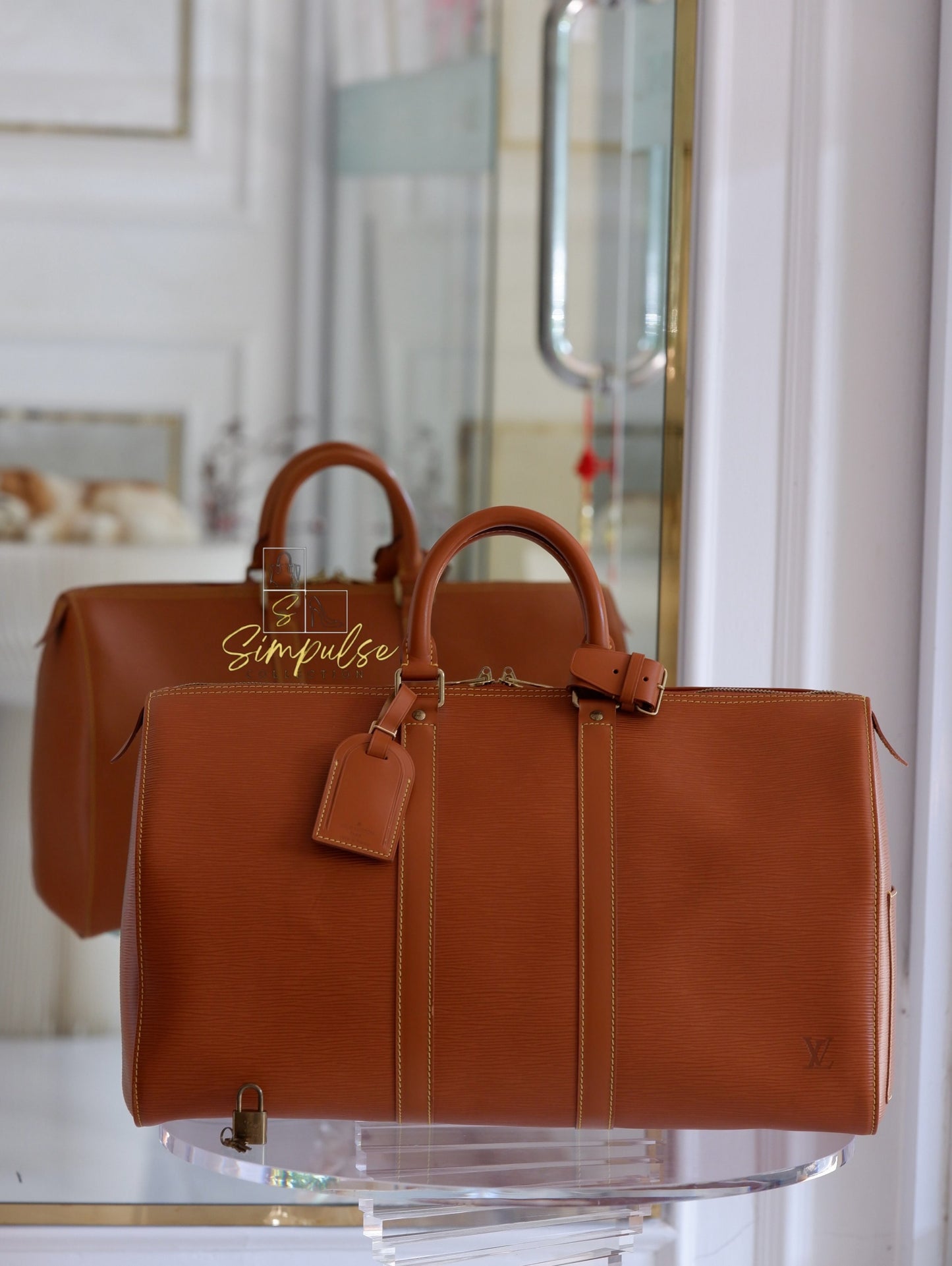 Louis Vuitton Keepall Epi Leather Cipango Gold