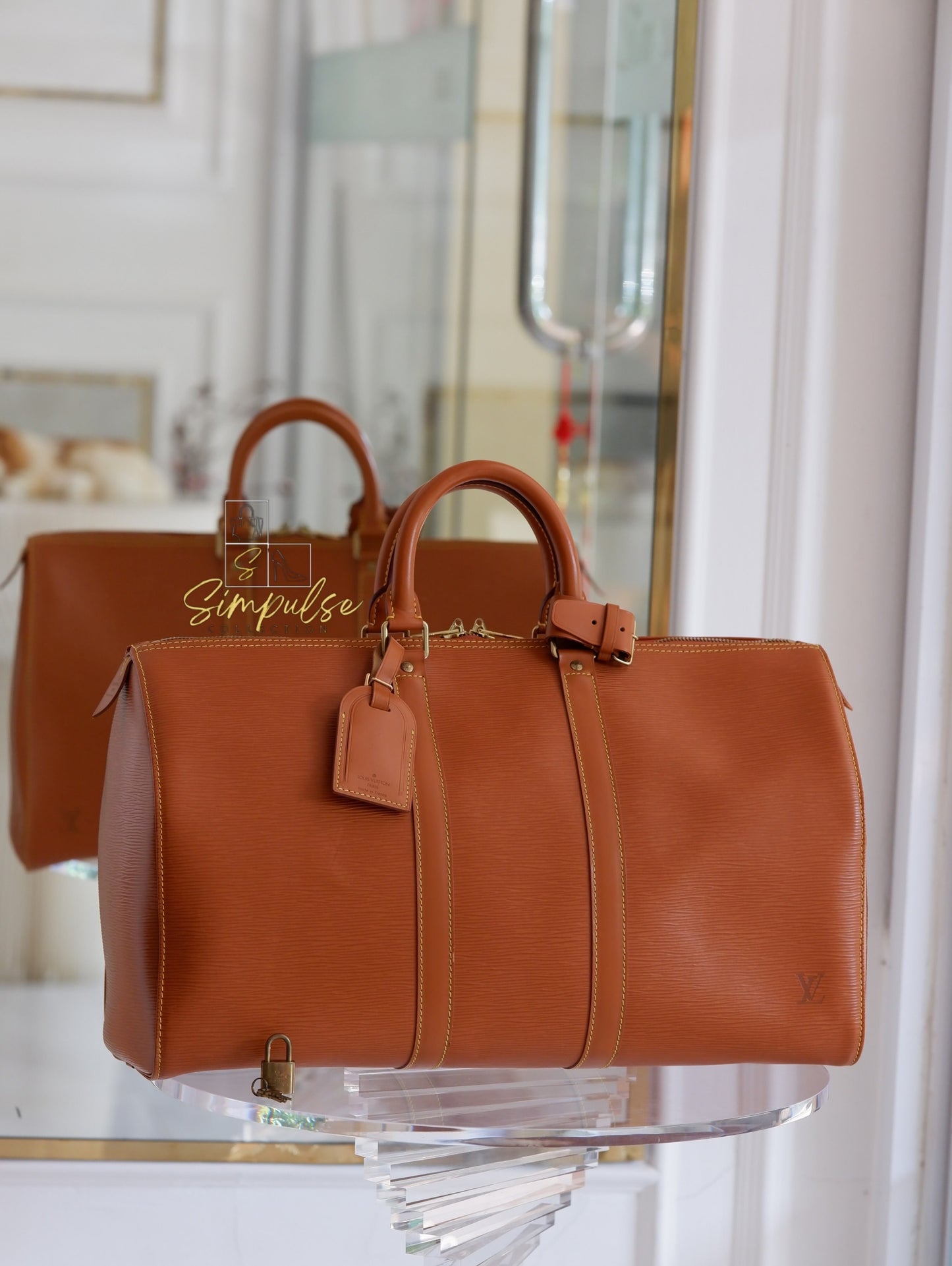 Louis Vuitton Keepall Epi Leather Cipango Gold