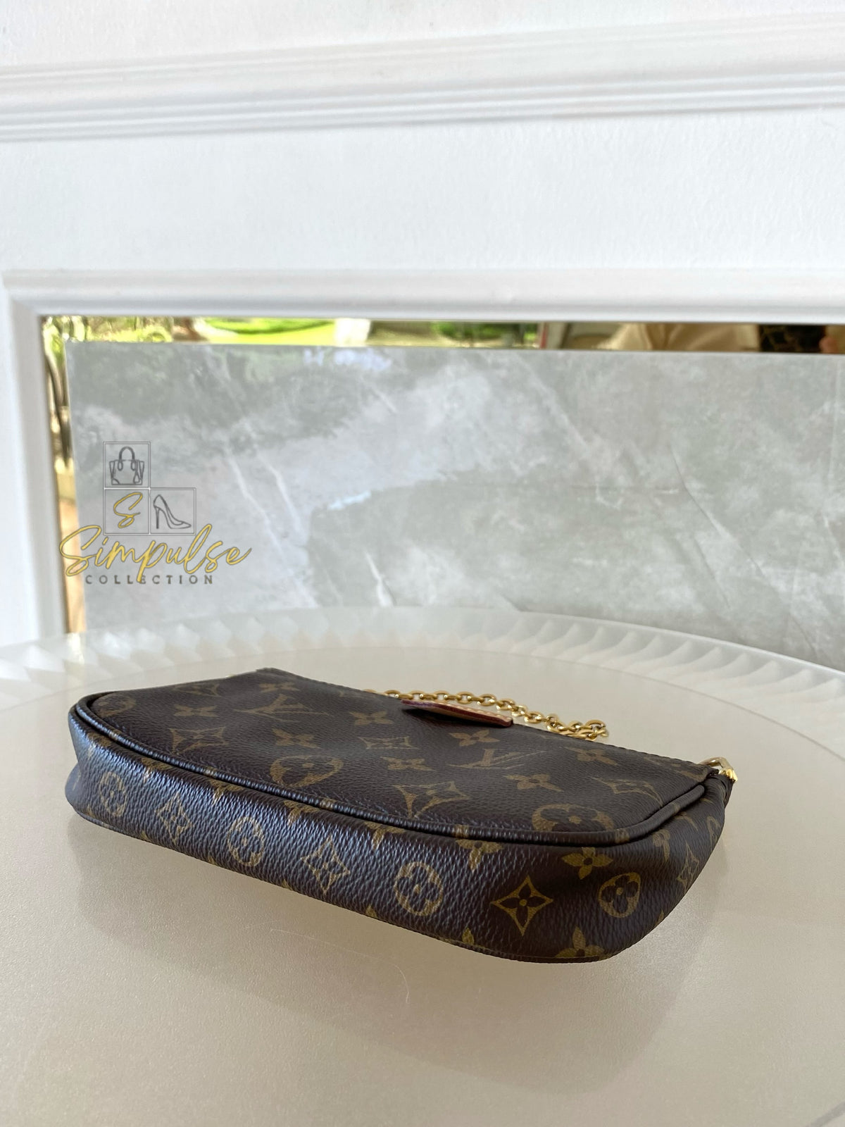 LOUIS VUITTON MULTI POCHETTE MONOGRAM W/GREEN STRAP