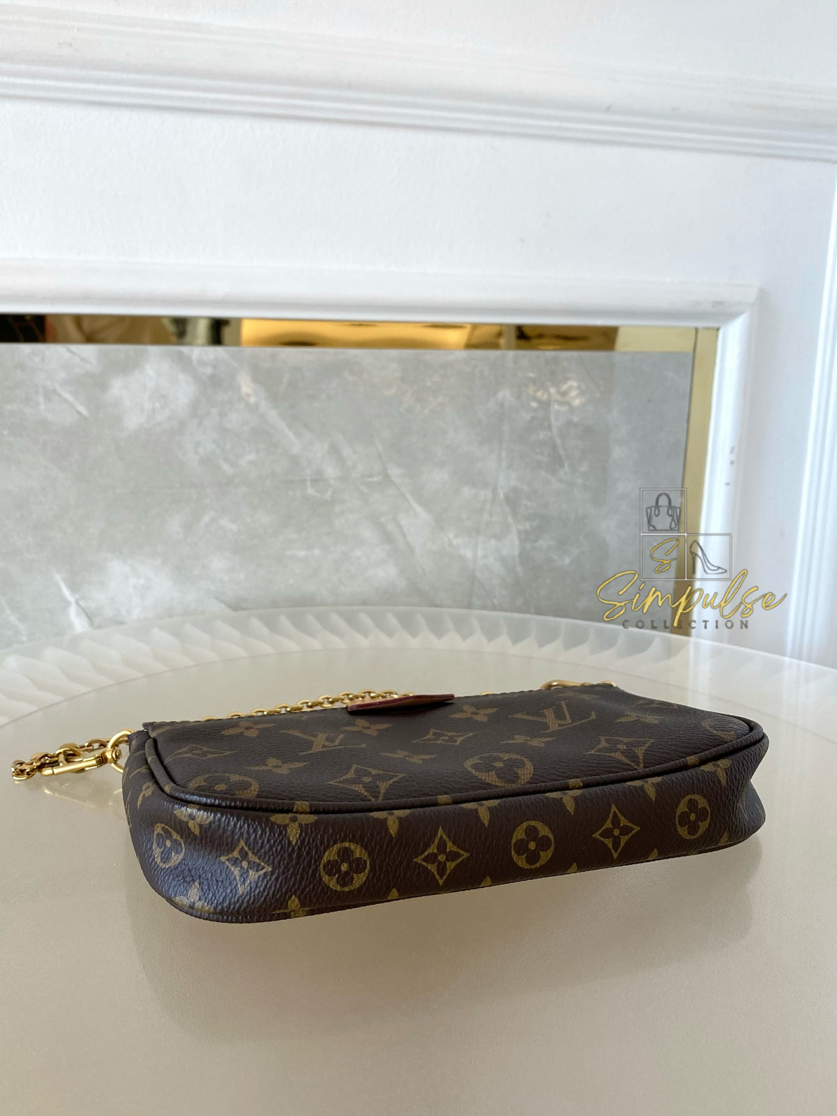 LOUIS VUITTON MULTI POCHETTE MONOGRAM W/GREEN STRAP