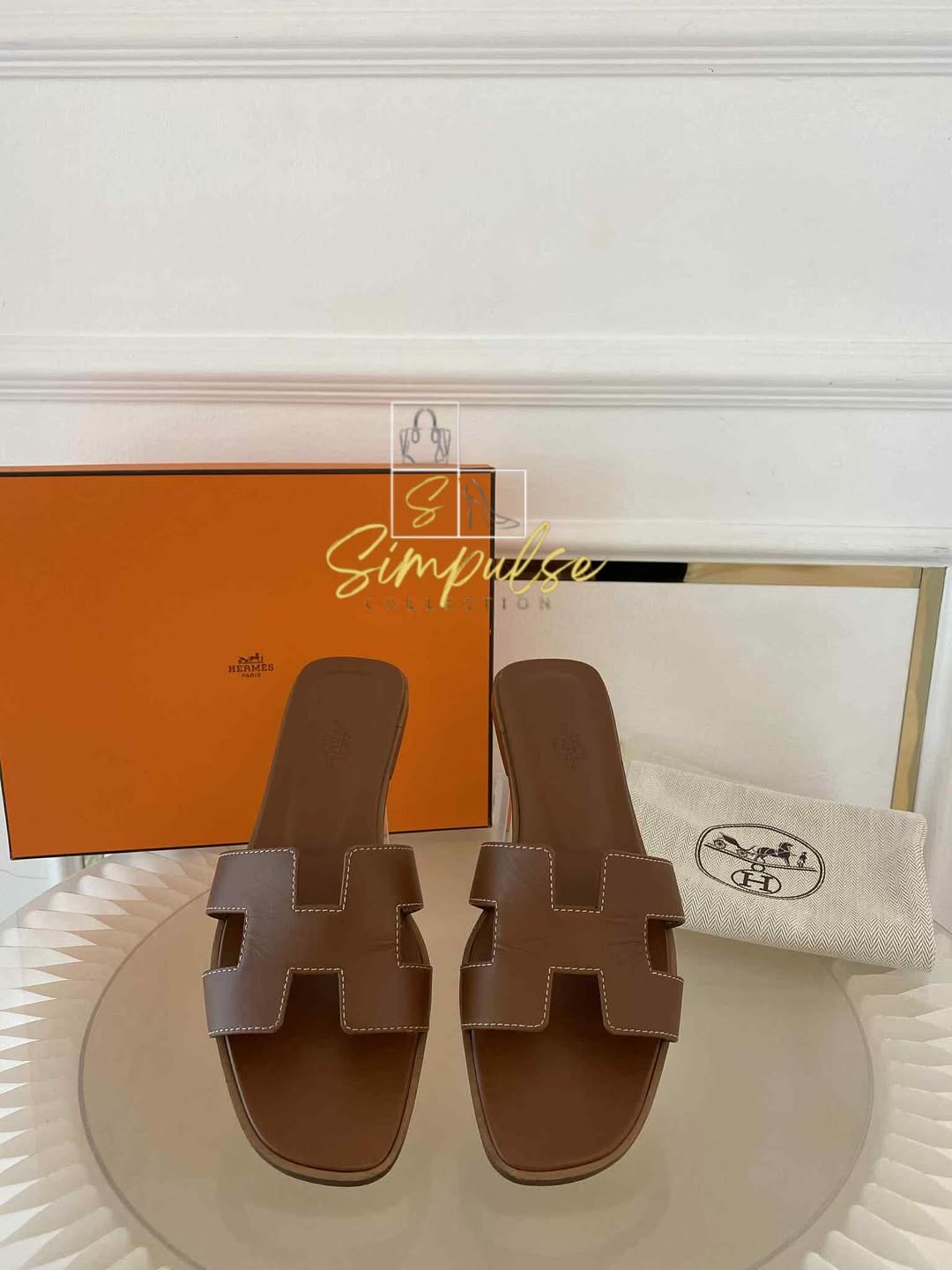 HERMES Oran Tan