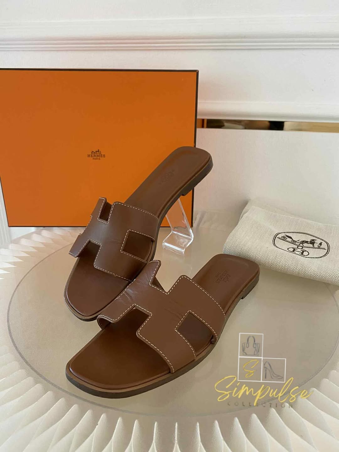 HERMES Oran Tan