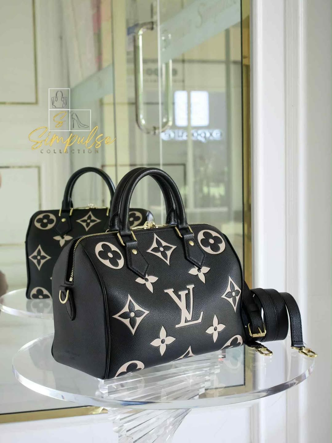 LOUIS VUITTON Speedy Bandouliere 25 Empreinte Leather Black