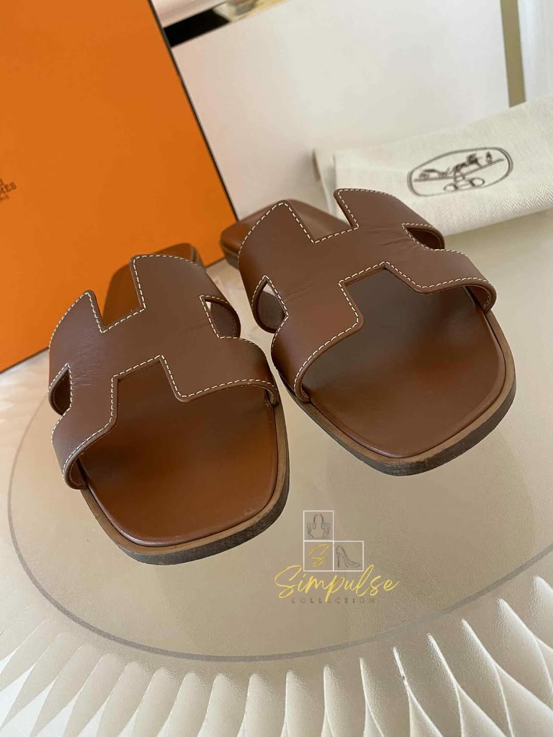 HERMES Oran Tan