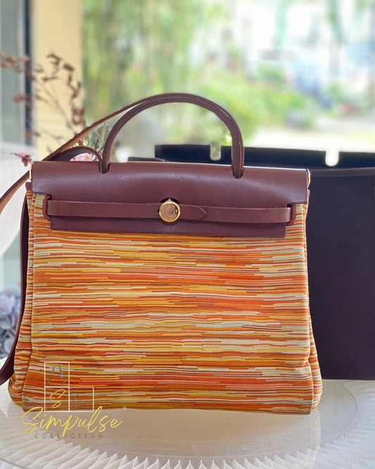 Her bag Vibrato & Leather Pm Size